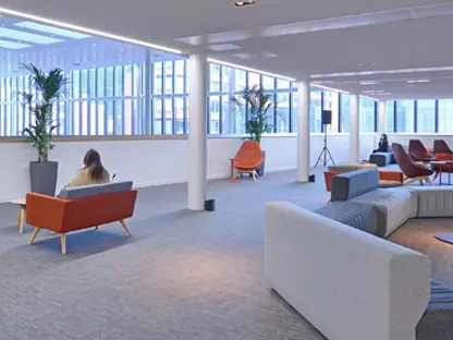 A study and social space in AMBS with chairs and sofas