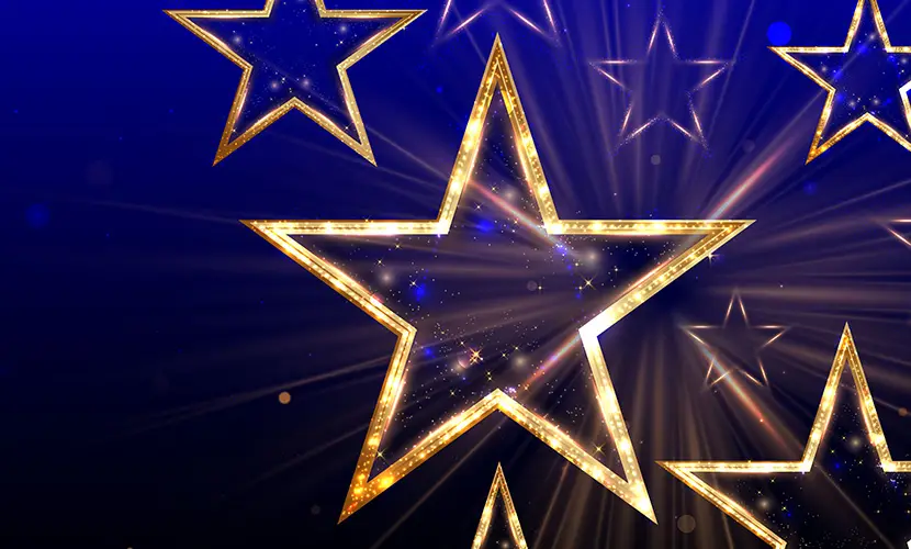 Gold stars on a purple background