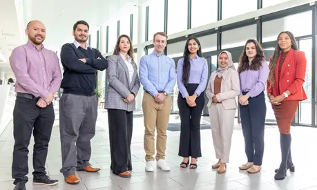 Members of the Full-time MBA student council stood in the AMBS reception