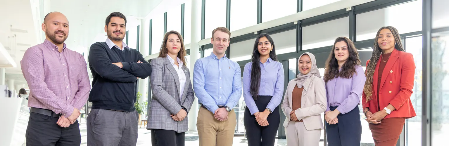 Members of the Full-time MBA student council stood in the AMBS reception