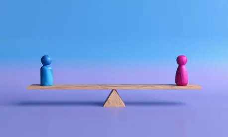 A blue and a pink figure create a perfect balance on a wooden seesaw against an intense purple background, highlighting the concept of gender equality.