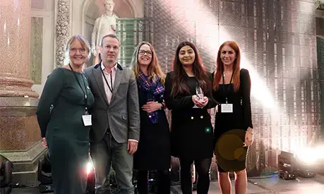 Tania (second right) receives her Innovate UK award