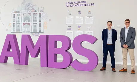 AMBS' Stuart Wells and Renaker's Andy Lofthouse stood in the AMBS foyer