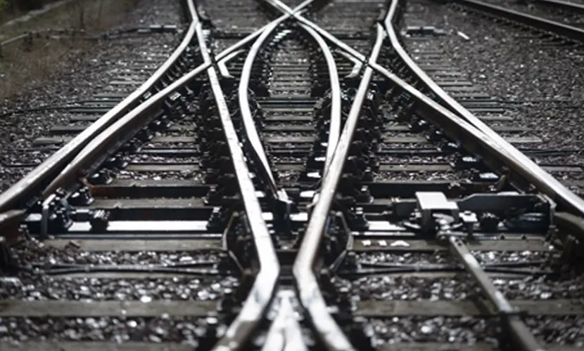 Black and white close-up of railway tracks