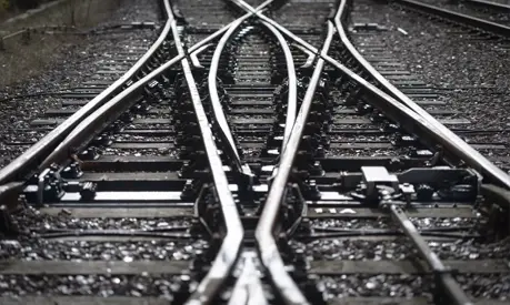 Black and white close-up of railway tracks