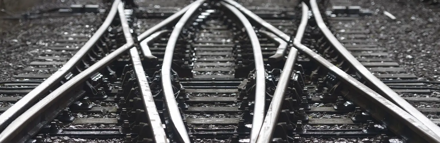 Black and white close-up of railway tracks