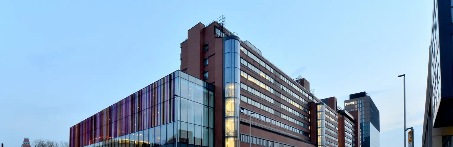 The AMBS building in the evening