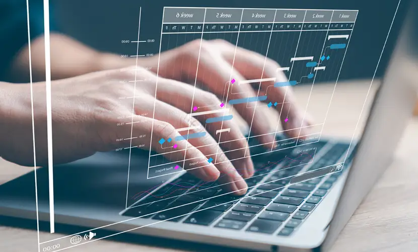 A graphic of an analyst typing a report with metrics connected to a database.