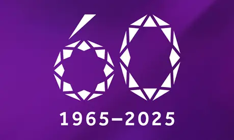 White graphic on a purple background. Graphic shows the number 60 depicted as two diamonds with 1965 to 2025 text beneath.