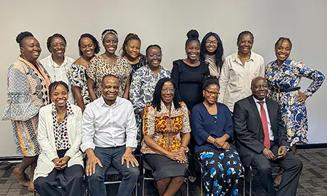 A group of 15 Zambian female doctors on the first cohort of the MRB's new training programme with Dr Cris Sachikonye.