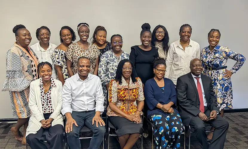 A group of 15 Zambian female doctors on the first cohort of the MRB's new training programme with Dr Cris Sachikonye.