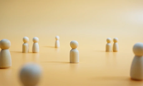 People represented by wooden figurines