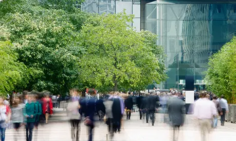 Commuters walking in a business area in blurred motion