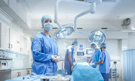 Portrait of specialist nurse in operating theatre.